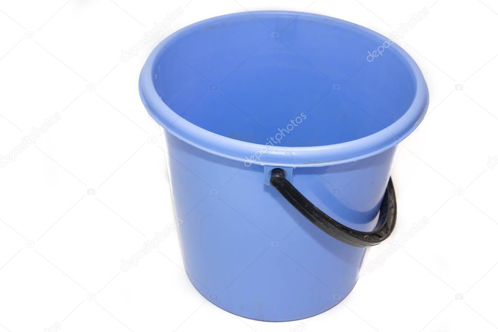 A bucket on a white background. Plastic blue bucket on a white background. Bucket for washing floors. Cleaning bucket