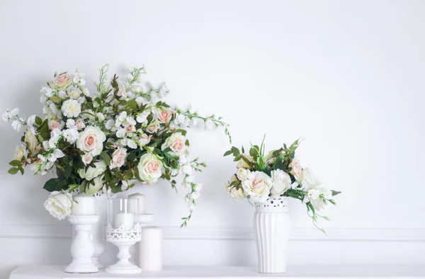 Wedding bouquet of white roses in a vase. Wedding decorations. White Rose. Wedding Attributes