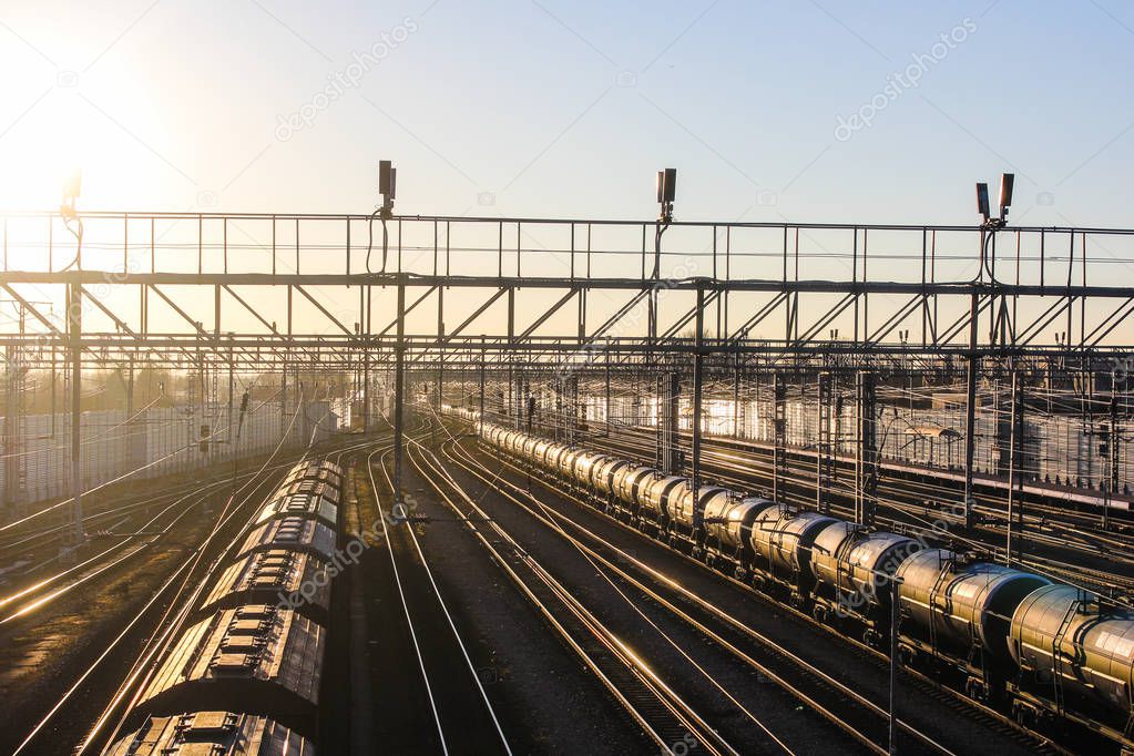 railway at sunset public transport. transportation of people and freight. travel around cities and countries