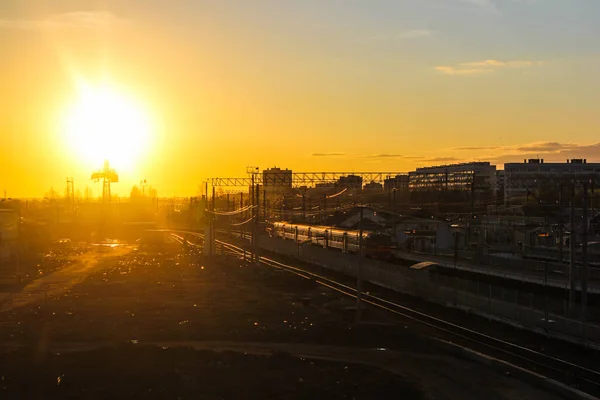 railway at sunset public transport. transportation of people and freight. travel around cities and countries