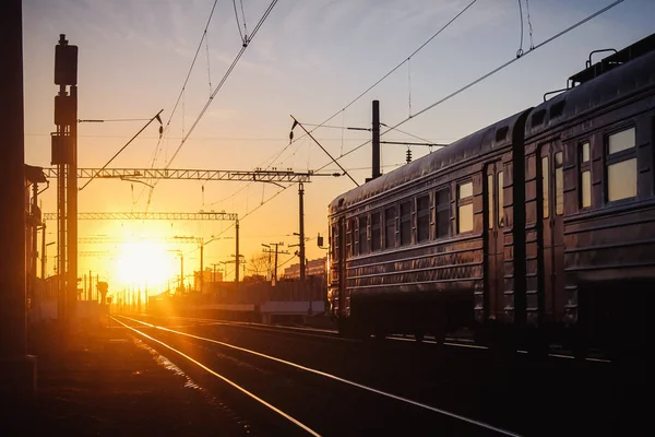 railway at sunset public transport. transportation of people and freight. travel around cities and countries