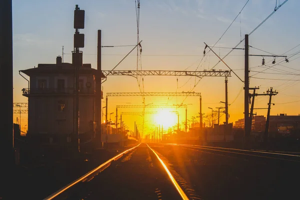 railway at sunset public transport. transportation of people and freight. travel around cities and countries