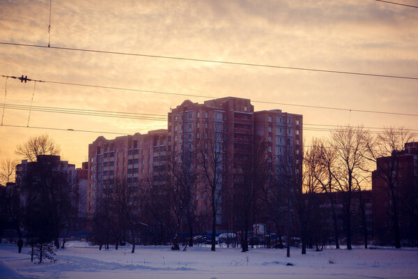 Colorful sunset over buildings at winter season