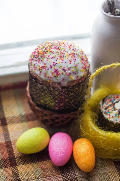 Postcard Happy Easter. Congratulations on a religious holiday. Orthodox holiday. Painted Easter eggs and traditional sugar-topped Easter cakes