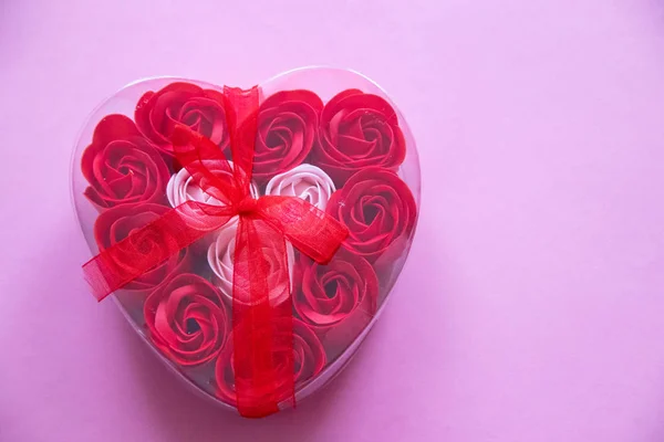 Perfumed soap in the form of a rose. Preparing for Valentine\'s Day. Holiday decoration. Red soap