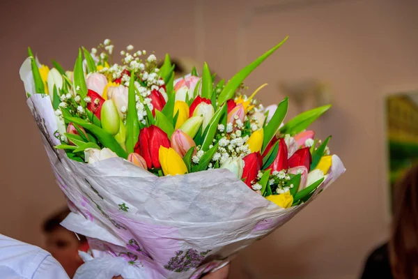 bouquet of tulips. bouquet of colored flowers tulips. gift bouquet. a bouquet of flowers