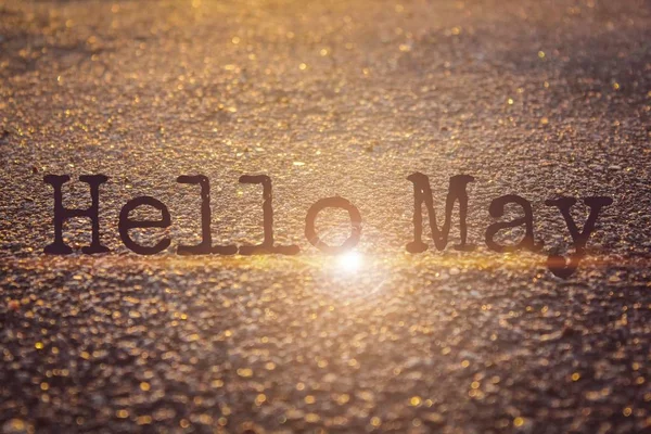 Banner hello may. Text on the photo hello May. Welcome card