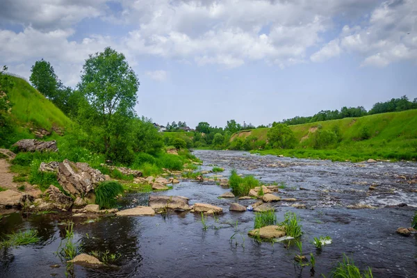 Sablinsky waterfalls. Little waterfall. The brown water of the waterfall.. Thresholds on the river. Strong water flow. Jets of water. Fast current