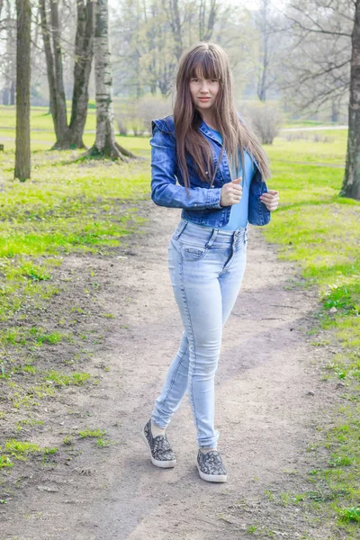 Young Beautiful Woman Jeans Shirt Posing Lake Spring Royalty Free Stock Photos