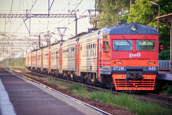 Russian train on the railway. Summer railway. Rails and sleepers. Russia, Suyda June 19, 2019