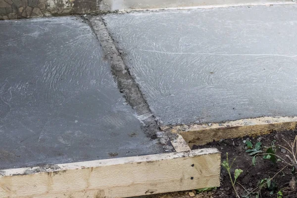 Pouring concrete base of house, form-work home construction — Stock Image Pouring Concrete Base House Form Work Home Construction Stock Photo