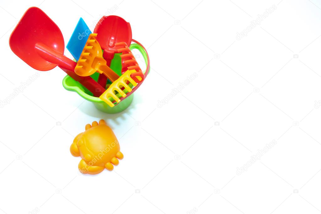 Plastic toys for sand isolated on white background. Kids toys.