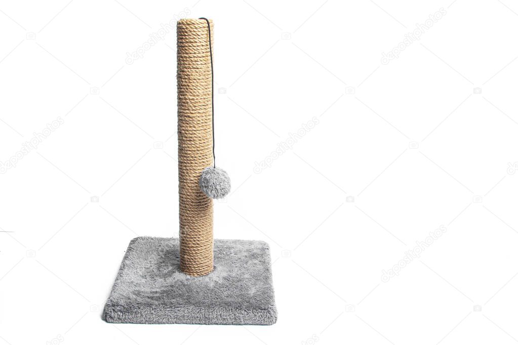 Isolated scratching post on a white background . Pet products. Grey scratching post. Games for animals. Copy space. Article about choosing a scratching post for cats. Isolated background