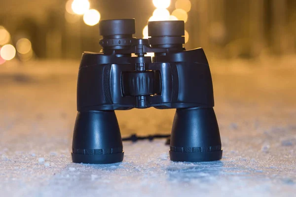 Binoculars closeup in the winter season. Evening time of day — Stock Photo, Image
