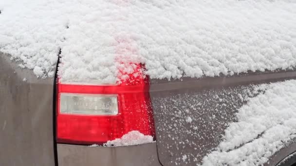 Car headlight in the snow in winter — Stock Video