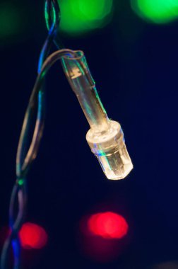 Garland beyaz ışık closeup Noel Led. Metin için yer ile şenlikli arka plan.