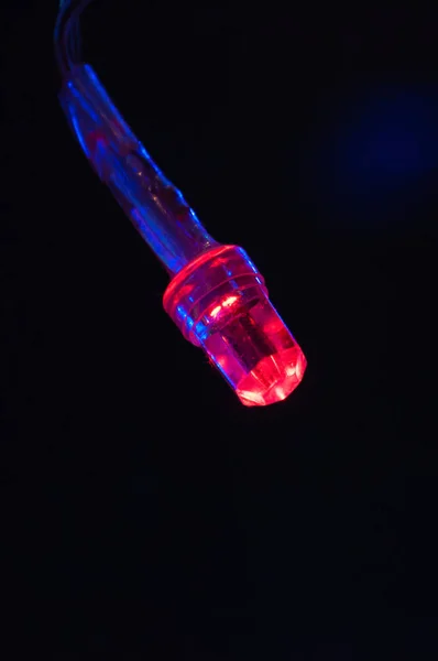 Red LED light Christmas garland close-up macro bokeh