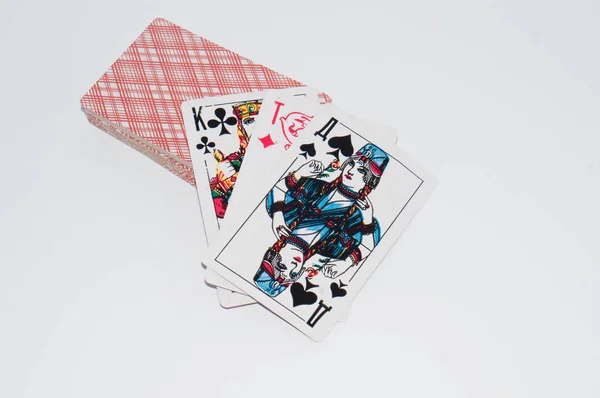 Deck of playing cards on a white background, copy space