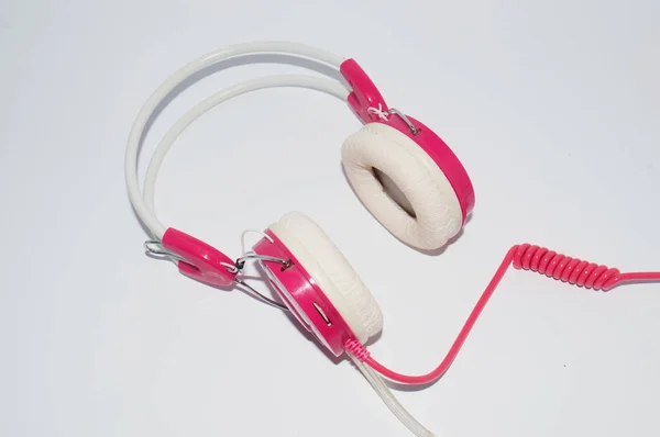 Pink headphones on white background, copy space for text. — Stock Photo, Image