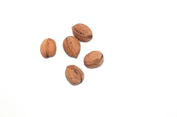 Walnuts on a white background isolated macro — Stock Photo, Image