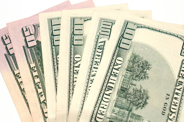 Para dolar beyaz bir arka planda yakın, izole. Konsept bankacılık ve finans