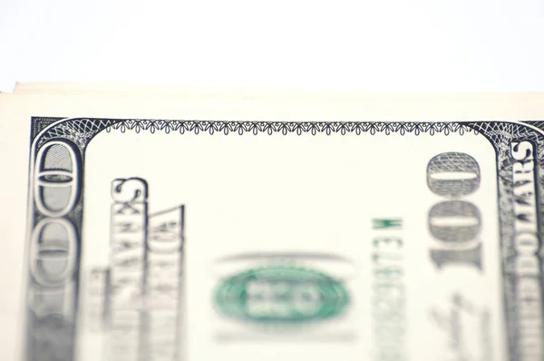 One hundred dollars close up, money on white background with copy space from top