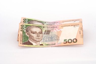 Beyaz bir arka plan üzerinde para Ukrayna Grivnası, banknotlar büyük bir paket