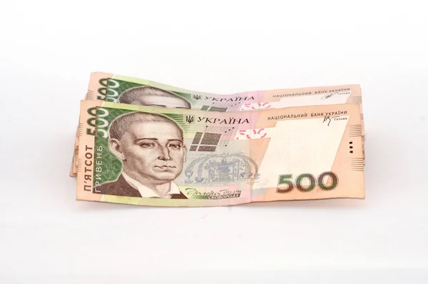 Beyaz bir arka plan üzerinde para Ukrayna Grivnası, banknotlar büyük bir paket