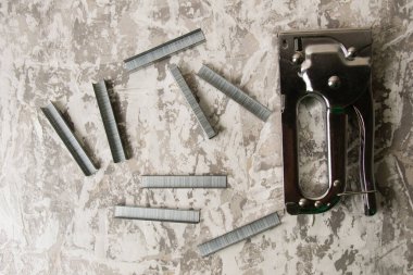 Yapı zımbası ve zımbaları fotokopi alanı olan bir macuna. İnşaat onarımı, konut koşullarının iyileştirilmesi