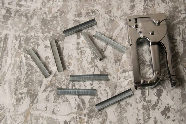 Yapı zımbası ve zımbaları fotokopi alanı olan bir macuna. İnşaat onarımı, konut koşullarının iyileştirilmesi