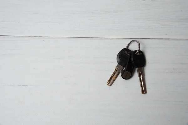 Κλειδιά Για Σπίτι Διαμέρισμα Ανοιχτό Ξύλινο Τραπέζι Ιστορικό Θέση Εισαγωγής — Φωτογραφία Αρχείου