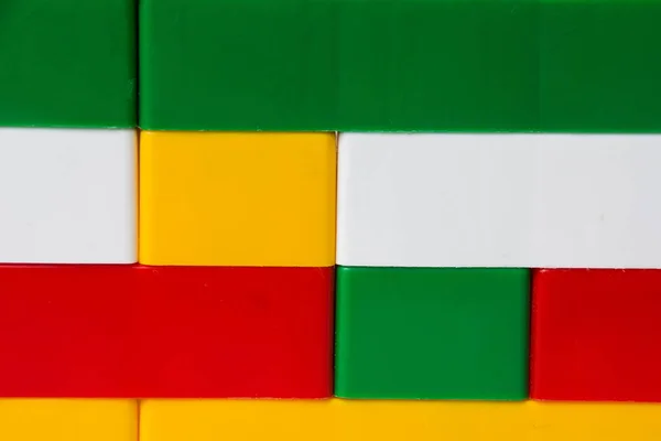 Uma Parede Blocos Plástico Antecedentes Detalhes Multicoloridos Designer Infantil — Fotografia de Stock