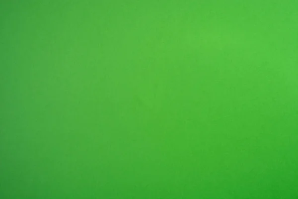 Sitelerin, menülerin, sosyal ağlardaki yayınların tasarımı için yeşil renkli dekoratif kağıt arka plan.