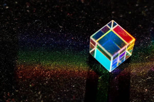 Colored square crystal on a black background