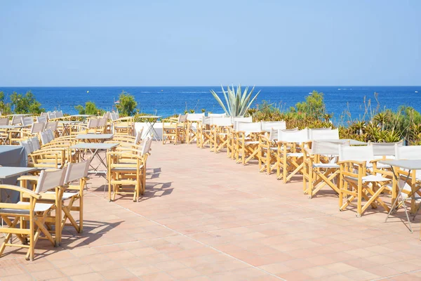 Empty Terrace Wooden Chairs Sea View Outdoors Greece Royalty Free Stock Photos