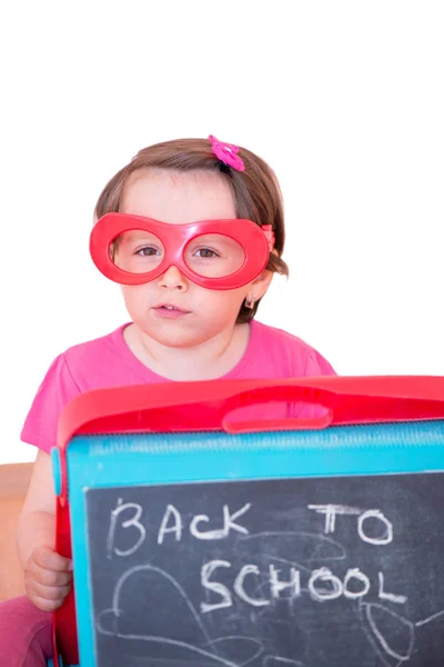 Little Girl Plastic Toy Eyeglasses Holding Blackboard Isolated — Stock Photo, Image