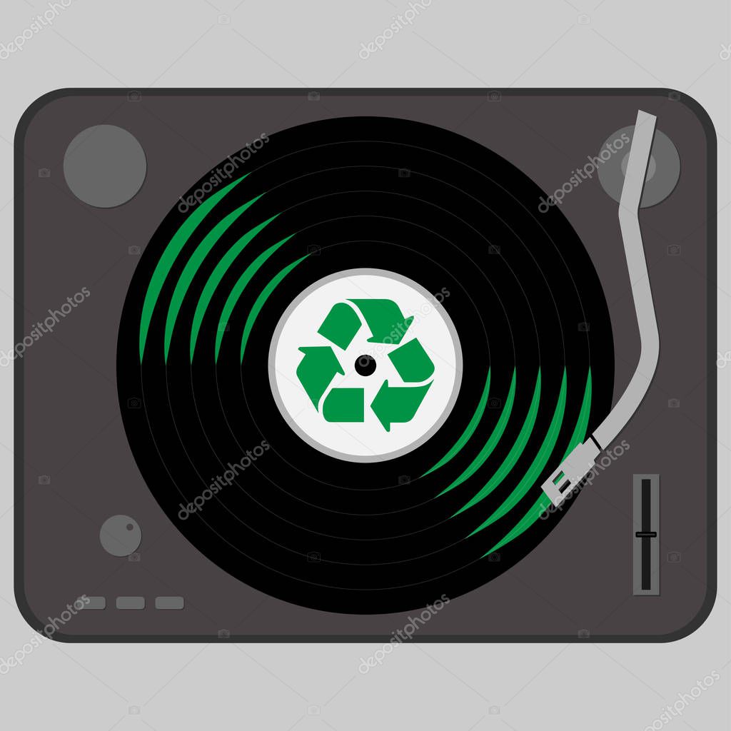 Turntable with a vinyl with recycle symbol on it