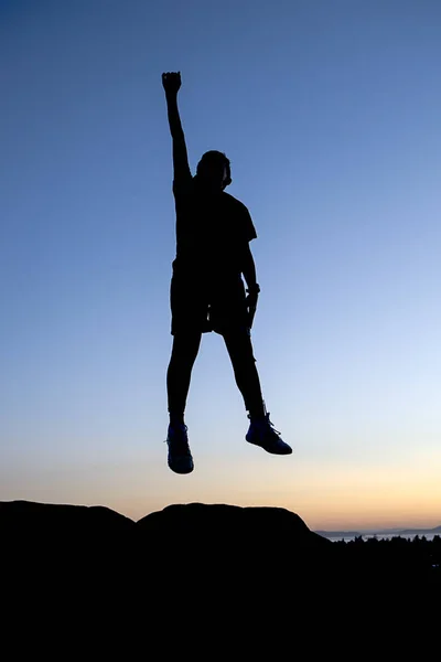 Concept image of boy leaping in the air. — Stock Photo, Image