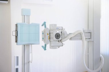 Bir röntgen makinesi ve radyoloji odası ekipmanının pgoto 'sunu kapat 