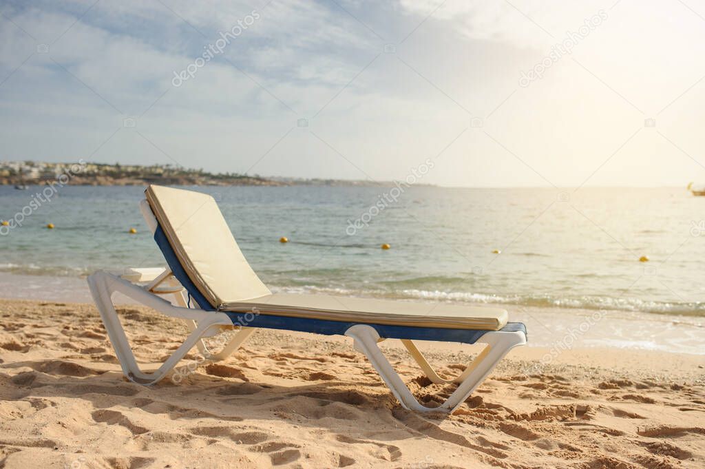 lateral view of a lounger on the beach of Red Sea coast