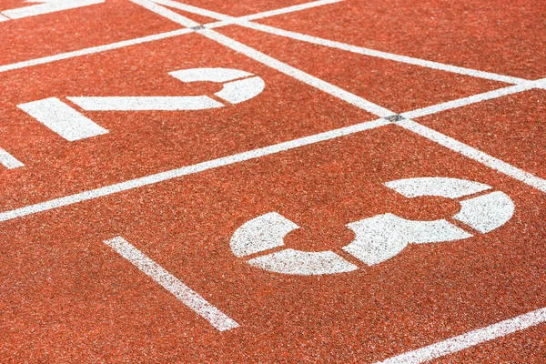 Starting numbers of running track in sports stadium — Stock Photo, Image