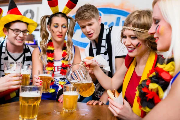 Football fans watching a game of the German national team — Stock Photo, Image