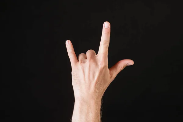 Male hand showing rock n roll sign — Stock Photo, Image