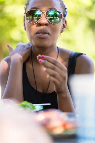 Stylish teenage girl having dinner — Stock Photo, Image