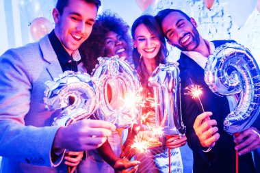 Men and women celebrating the new year 2019 clipart