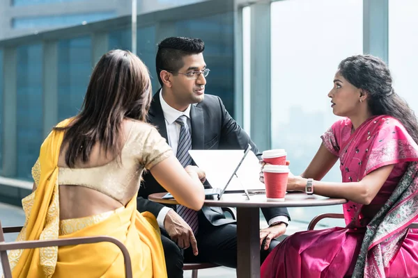 Three Indian business people talking during break at work — Stock Photo, Image