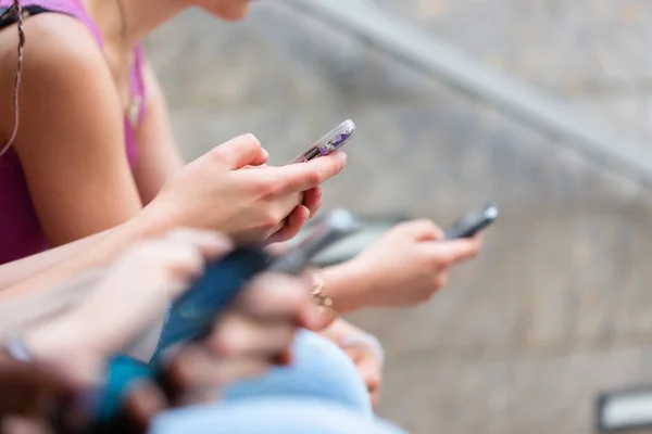 Close-up of hands holding smartphone — Stock Photo, Image