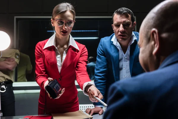 Two persuasive investigators trying to obtain a confession — Stock Photo, Image