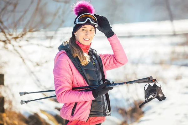 Fit woman Nordic walking in winter landscape — Stock Photo, Image
