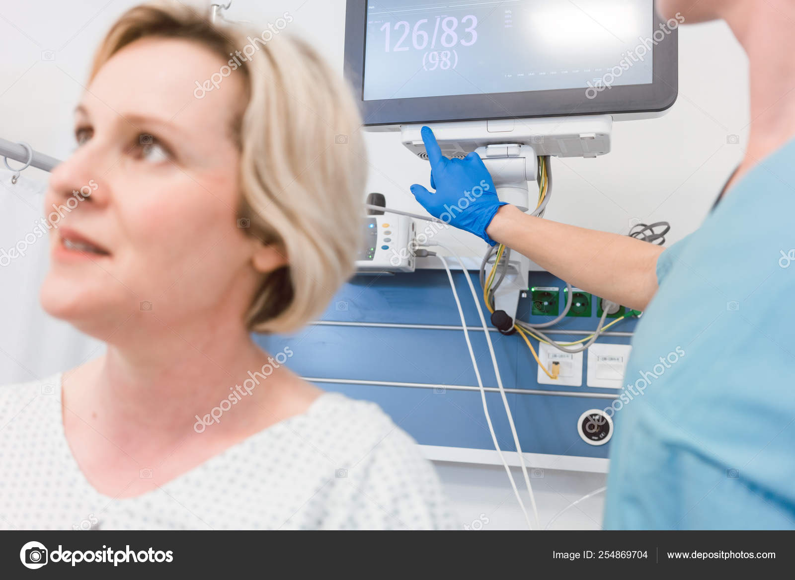 Patient In Recovery Room Of Modern Hospital Stock Photo